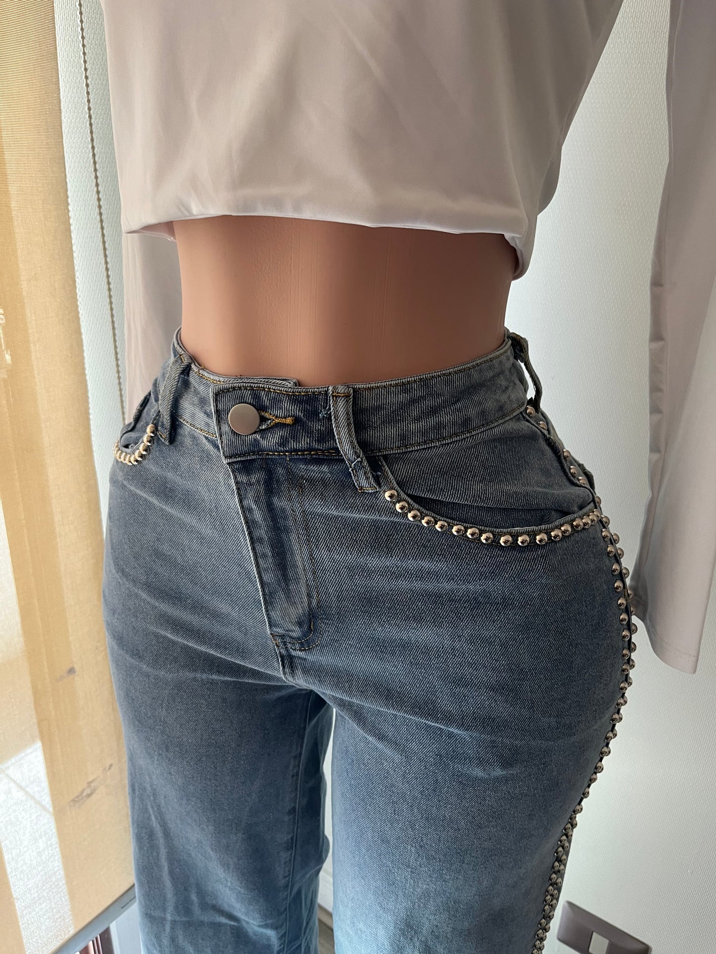 Jeans tachas